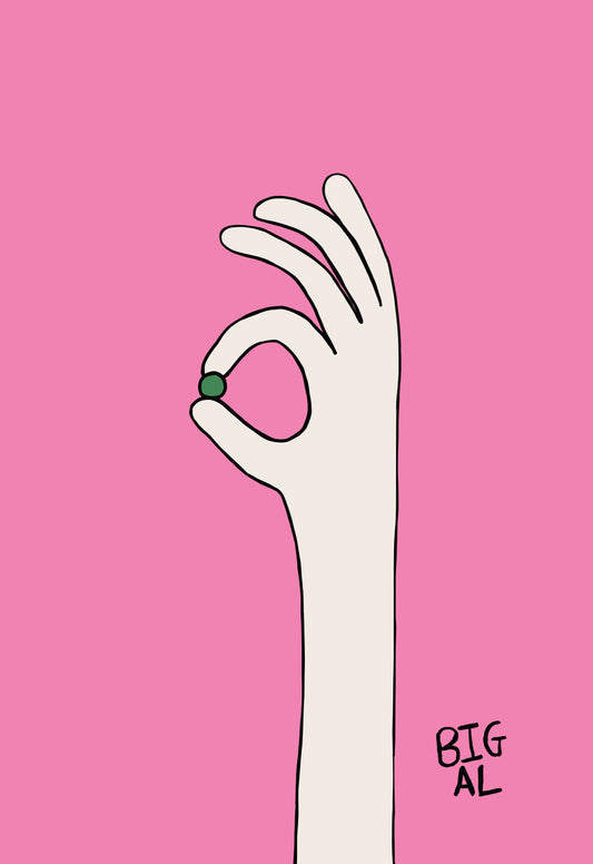 Hand Holding Pea